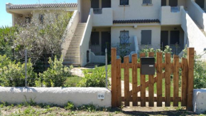 Bilocale con giardino privato, terrazza vista mare e incantevoli tramonti sul promontorio di Capo Testa - IUN Q2226